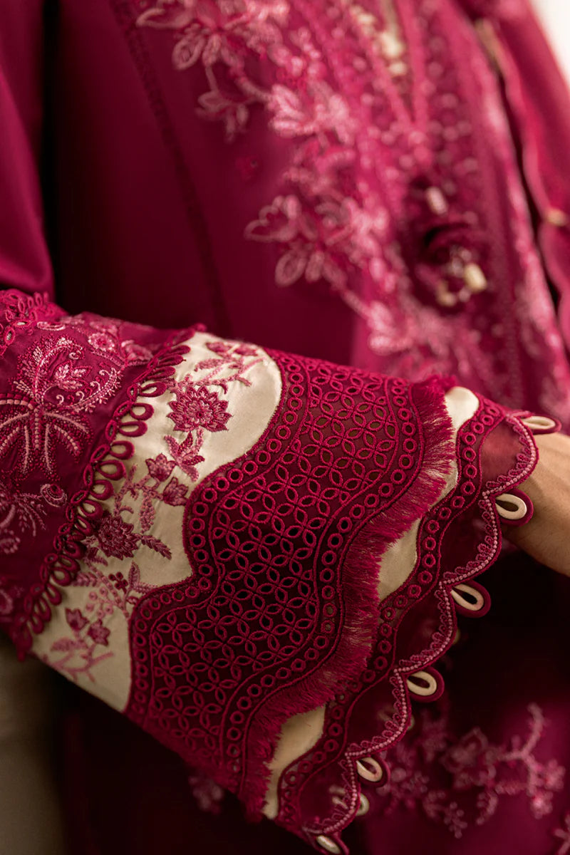 Model wearing maroon Qalamkar SB-02 Sameen embroidered outfit, ideal for Eid festivities and Pakistani luxury pret online in UK.