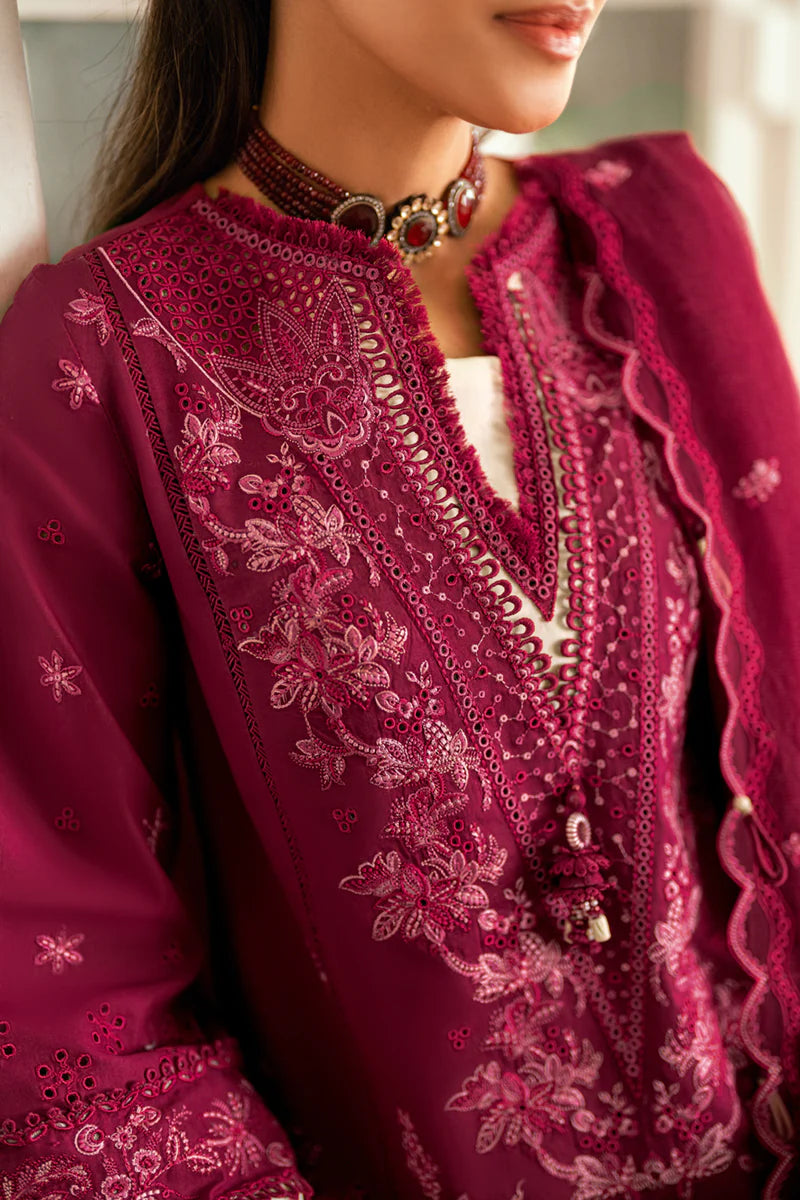Model wearing maroon Qalamkar SB-02 Sameen embroidered outfit, ideal for Eid festivities and Pakistani luxury pret online in UK.