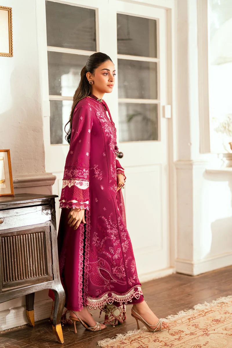 Model wearing maroon Qalamkar SB-02 Sameen embroidered outfit, ideal for Eid festivities and Pakistani luxury pret online in UK.