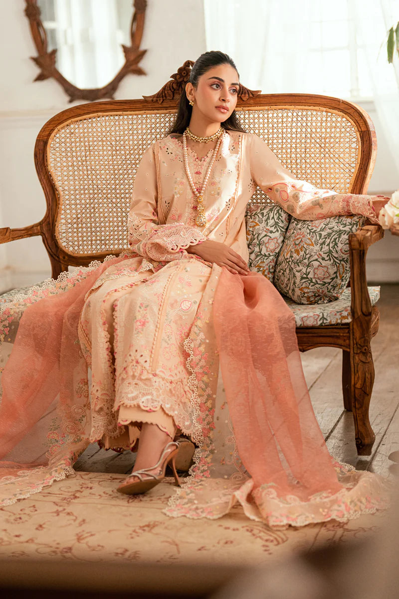 Model wearing peach Qalamkar SB-07 Zoya embroidered suit with floral detailing, perfect for Eid and Pakistani luxury pret online in UK.