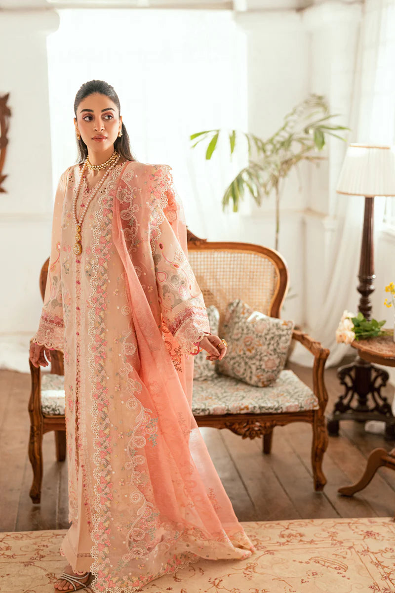 Model wearing peach Qalamkar SB-07 Zoya embroidered suit with floral detailing, perfect for Eid and Pakistani luxury pret online in UK.