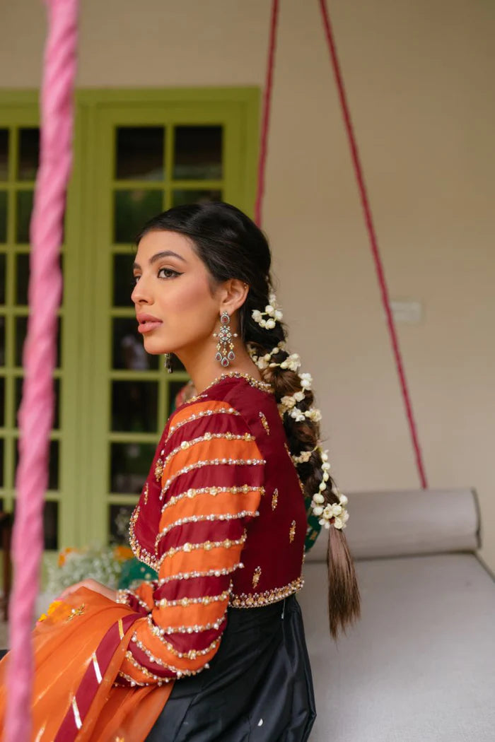 Model wearing Saira Rizwan Mehndi Bridals Ruhi dress, showcasing Pakistani clothes online in UK.