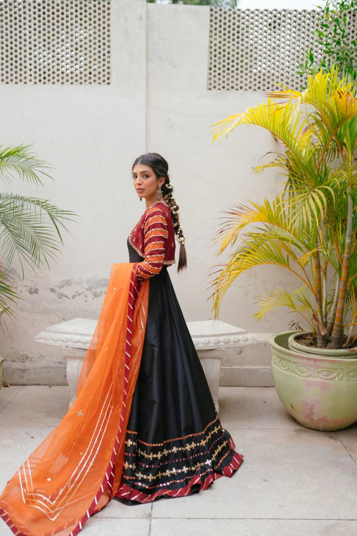 Model wearing Saira Rizwan Mehndi Bridals Ruhi dress, showcasing Pakistani clothes online in UK.