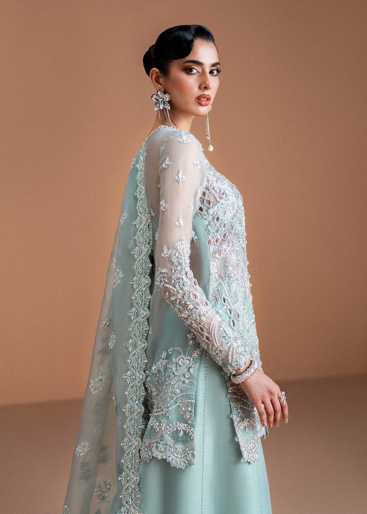 Model wearing mint green Vania outfit from Kanwal Malik, featuring delicate embroidery for Pakistani luxury pret and clothes online in UK.