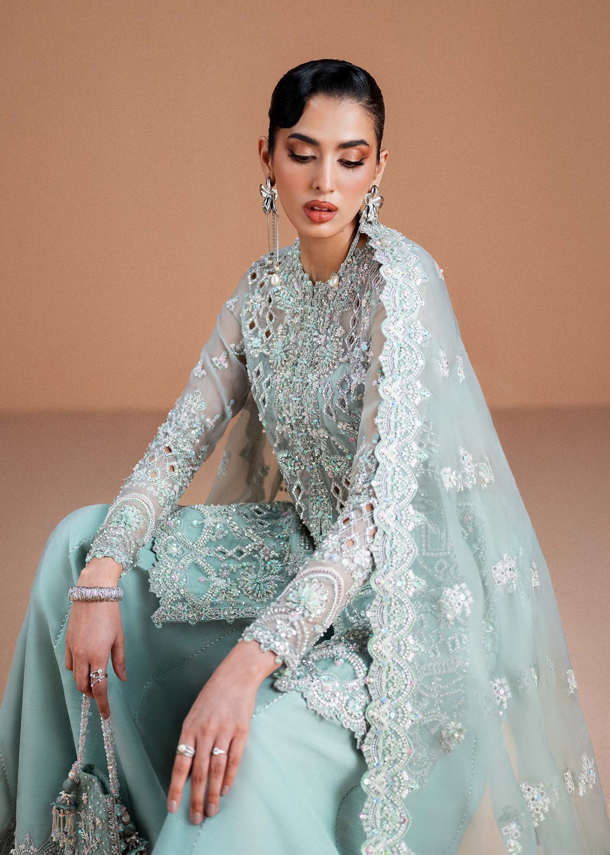 Model wearing mint green Vania outfit from Kanwal Malik, featuring delicate embroidery for Pakistani luxury pret and clothes online in UK.