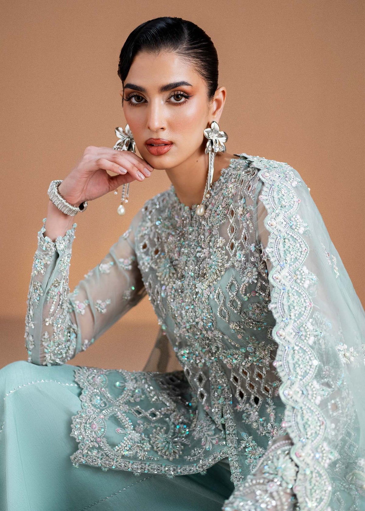 Model wearing mint green Vania outfit from Kanwal Malik, featuring delicate embroidery for Pakistani luxury pret and clothes online in UK.