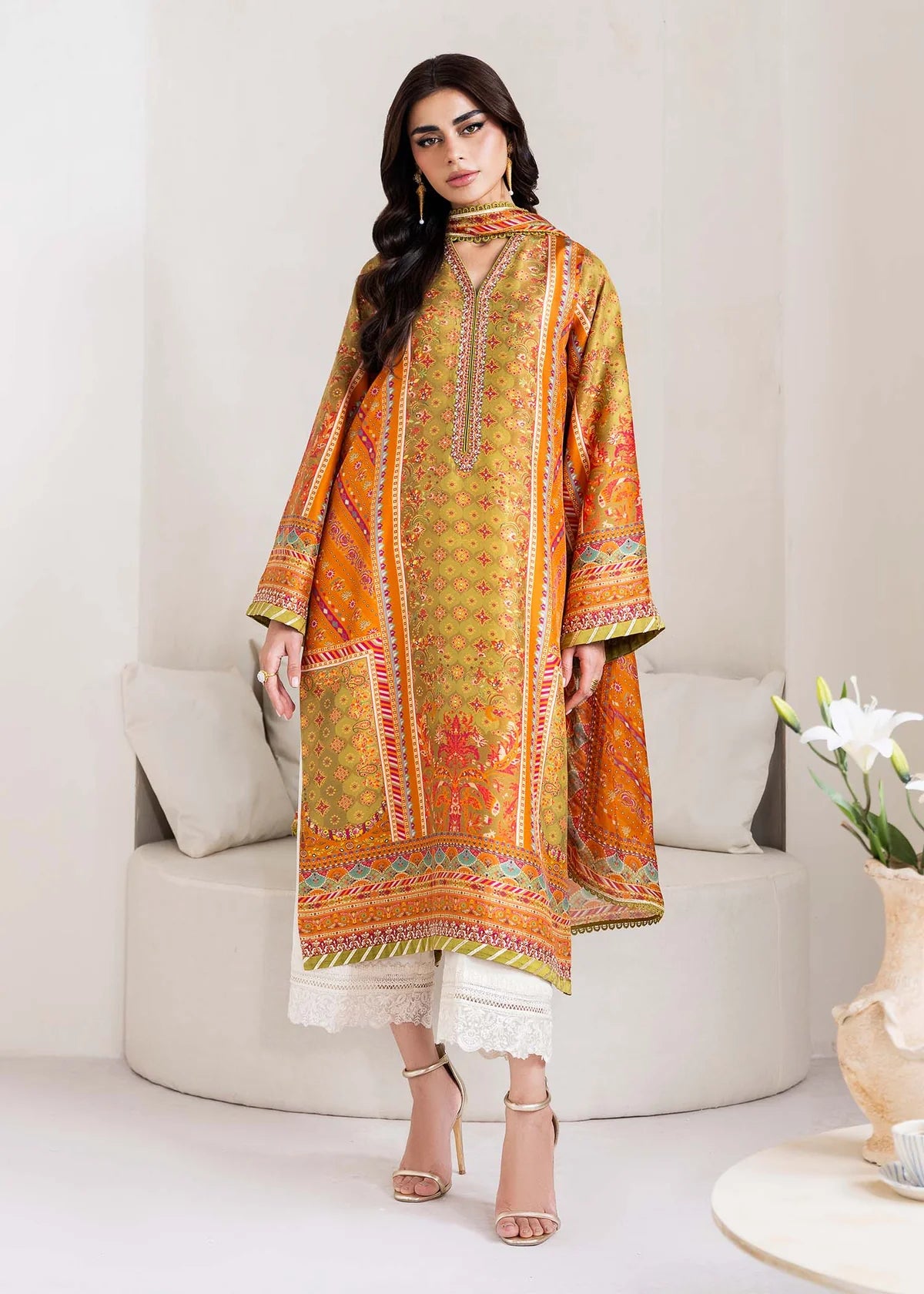 Model wearing olive and orange Elise from Kanwal Malik Rosalia Silk Eid Collection '25, Pakistani luxury pret and clothes online in UK.