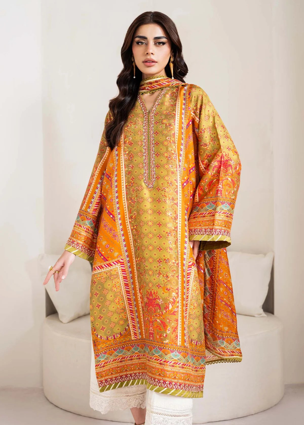 Model wearing olive and orange Elise from Kanwal Malik Rosalia Silk Eid Collection '25, Pakistani luxury pret and clothes online in UK.