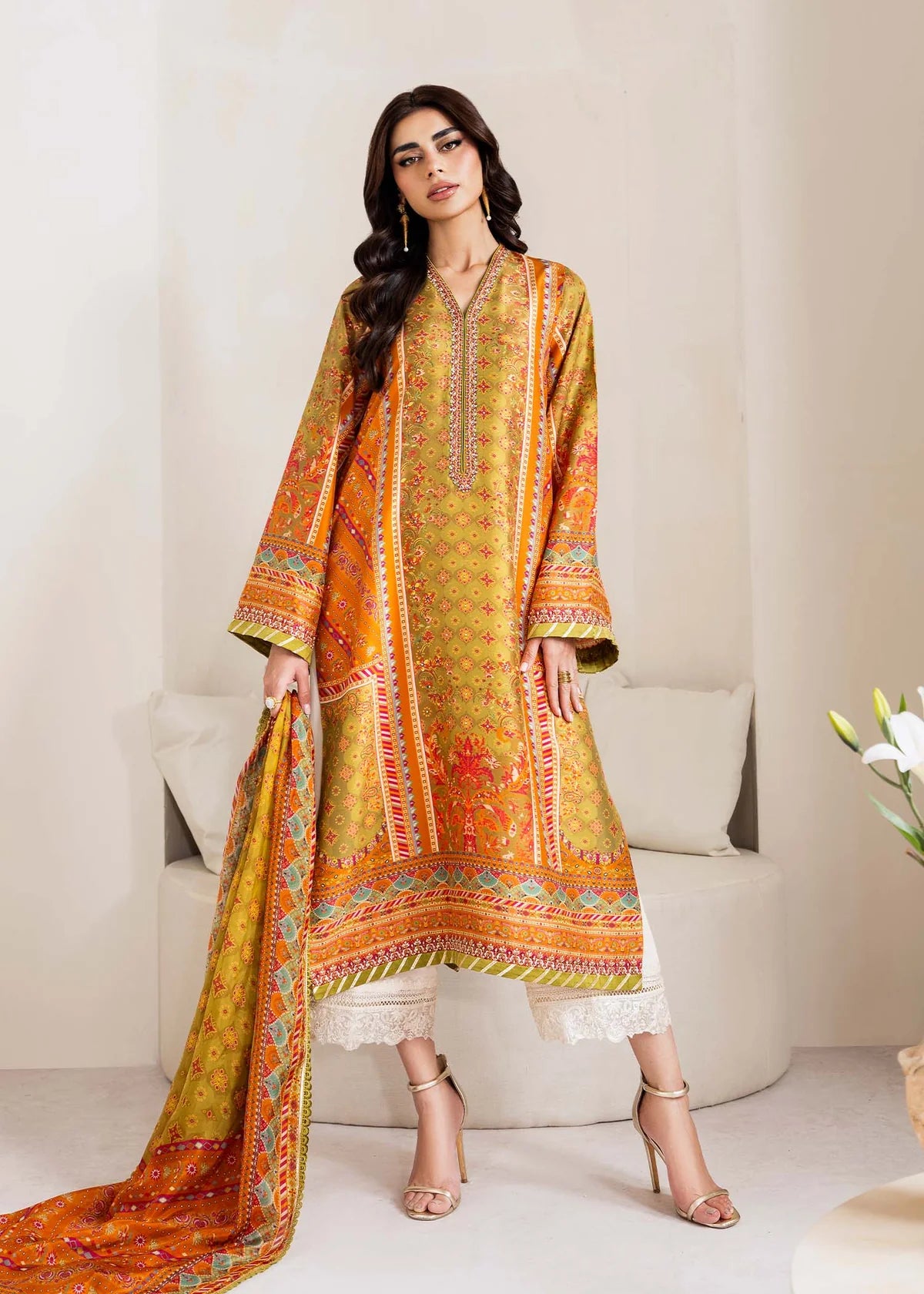 Model wearing olive and orange Elise from Kanwal Malik Rosalia Silk Eid Collection '25, Pakistani luxury pret and clothes online in UK.