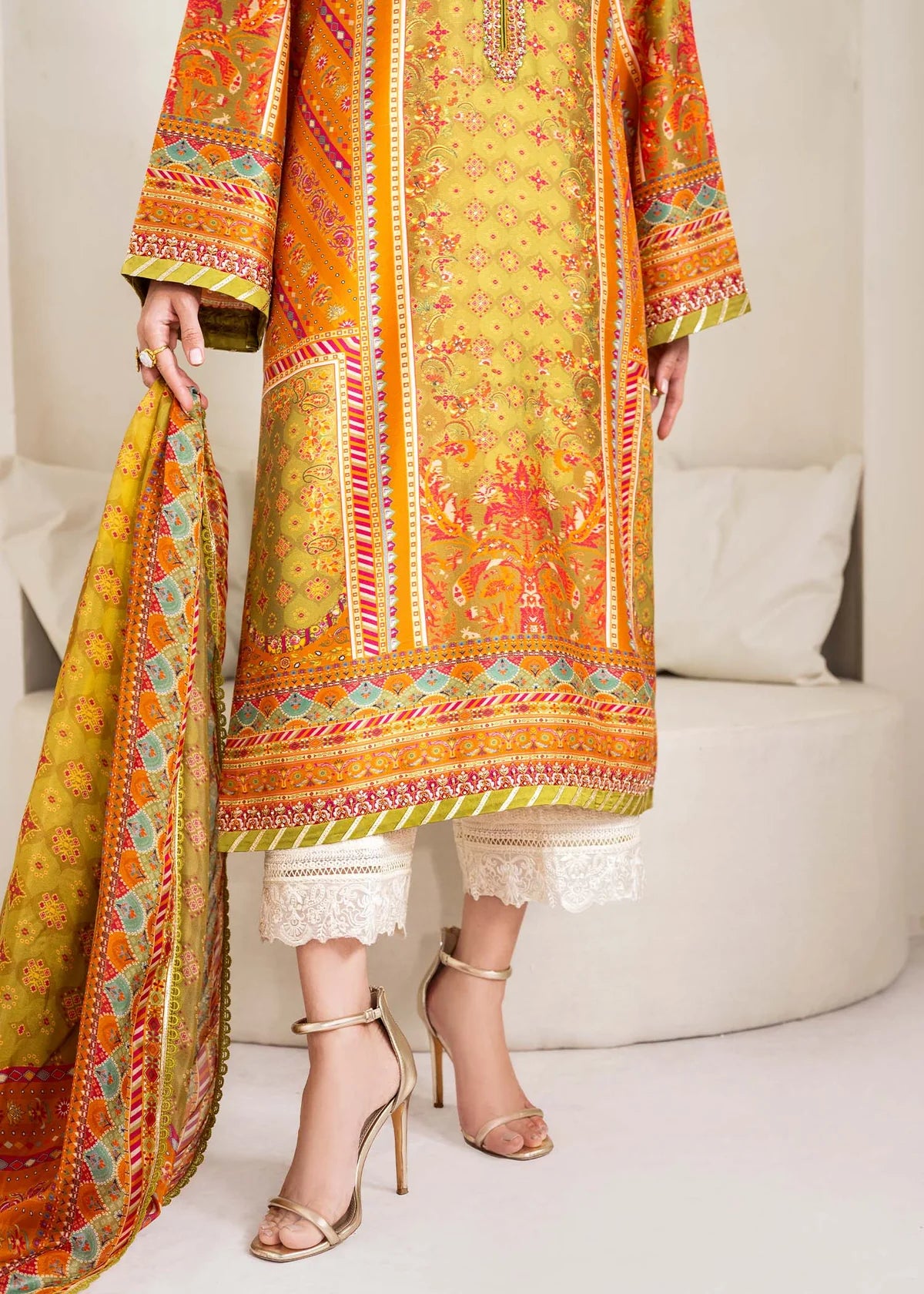 Model wearing olive and orange Elise from Kanwal Malik Rosalia Silk Eid Collection '25, Pakistani luxury pret and clothes online in UK.