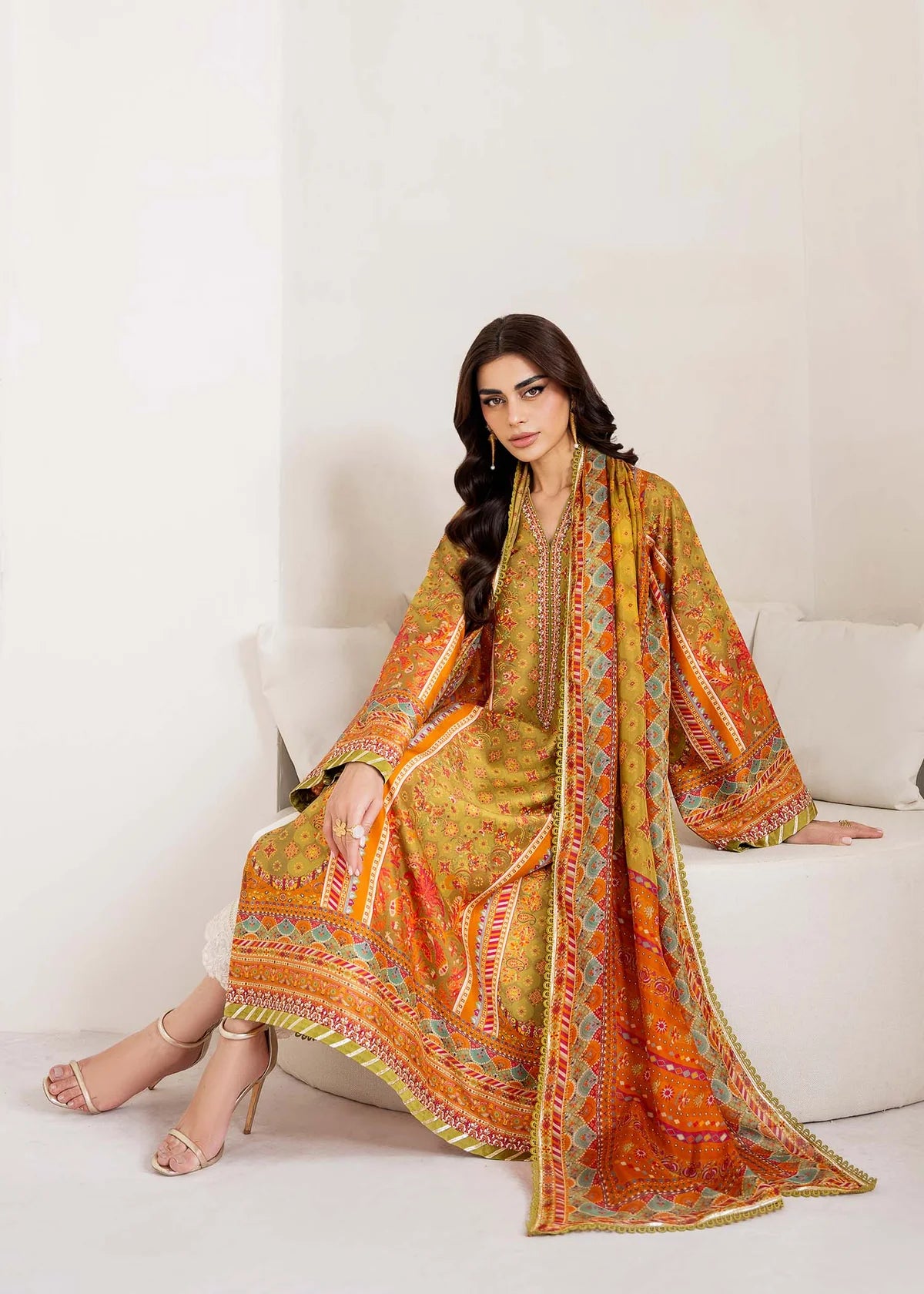 Model wearing olive and orange Elise from Kanwal Malik Rosalia Silk Eid Collection '25, Pakistani luxury pret and clothes online in UK.