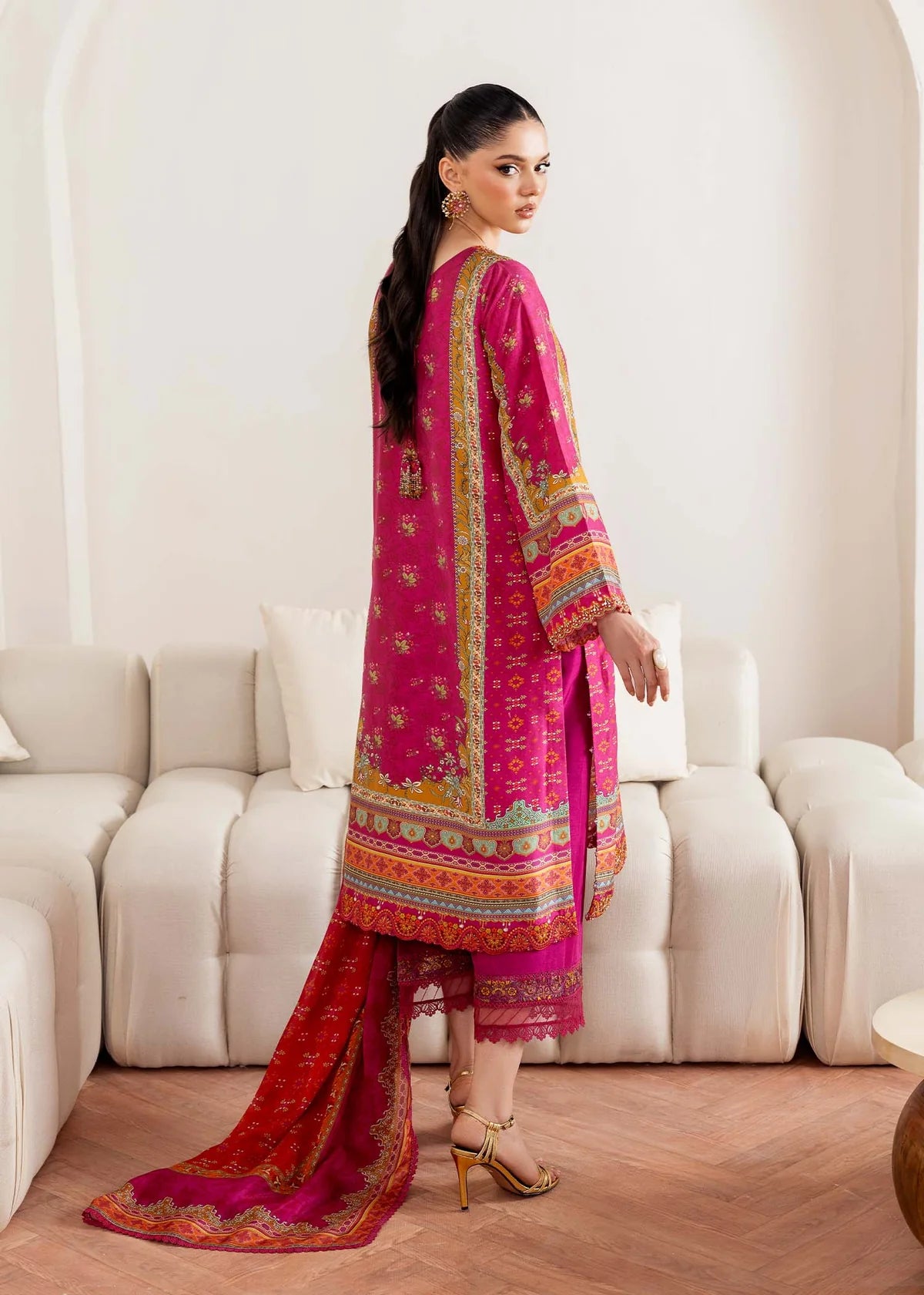 Model wearing deep pink Sylvie from Kanwal Malik Rosalia Silk Eid Collection '25, Pakistani luxury pret available online in UK.