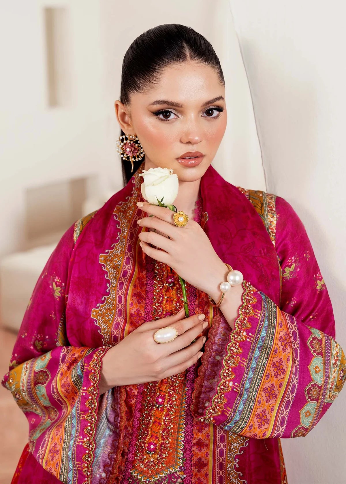 Model wearing deep pink Sylvie from Kanwal Malik Rosalia Silk Eid Collection '25, Pakistani luxury pret available online in UK.