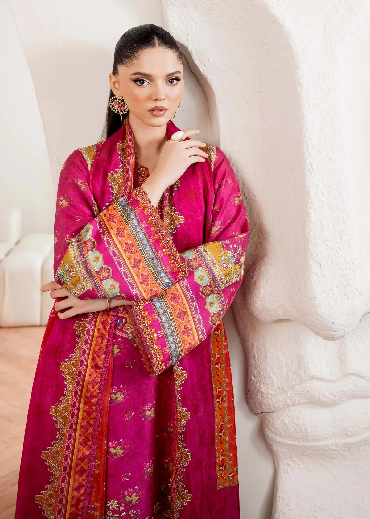 Model wearing deep pink Sylvie from Kanwal Malik Rosalia Silk Eid Collection '25, Pakistani luxury pret available online in UK.