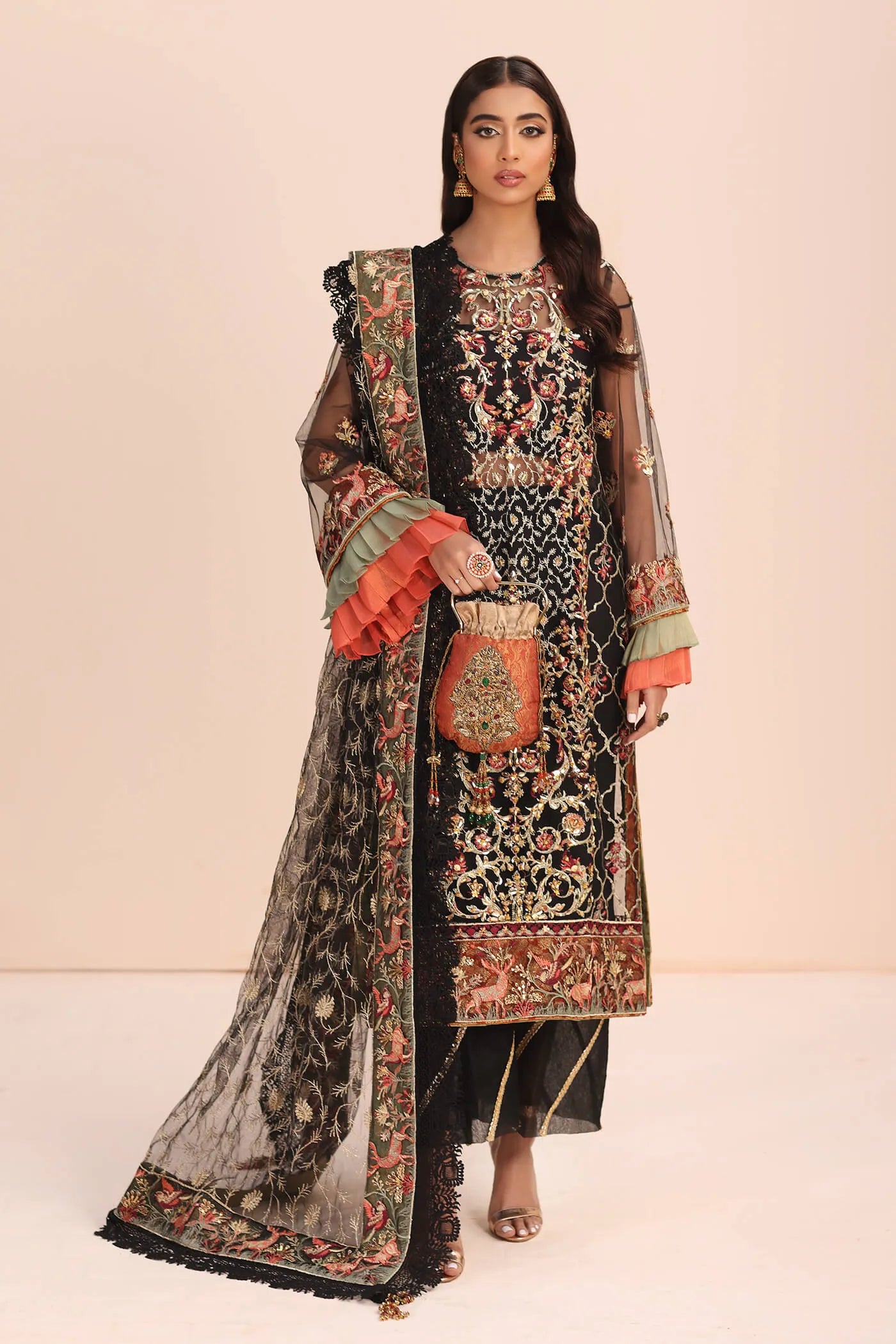 Model in Musferah Saad Empress Noir black Pakistani wedding dress, UK.