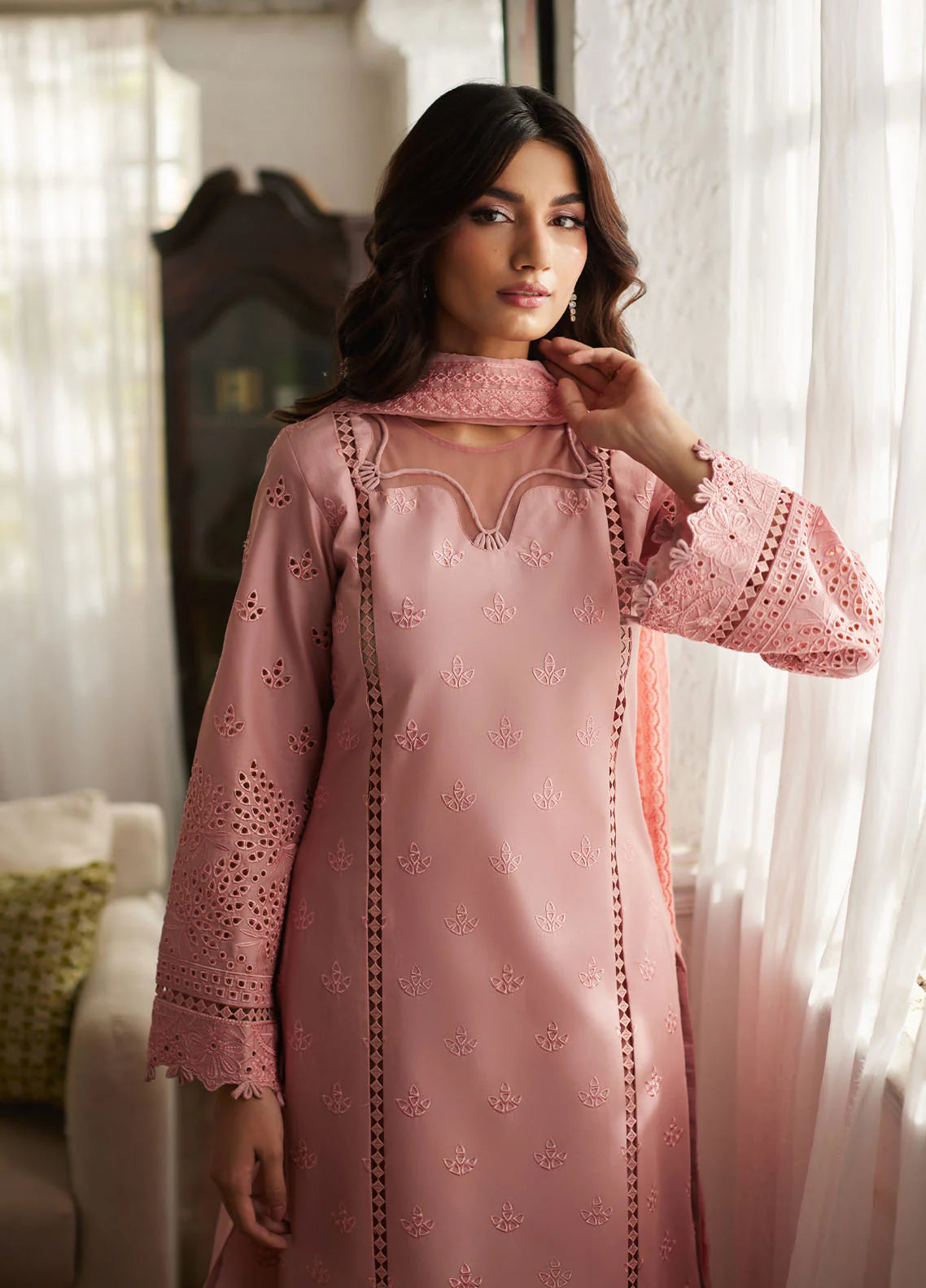 Model wearing blush pink Zerin from Gulaal Lumiere Chikankaari Lawn, Pakistani luxury pret and Pakistani clothes online in UK.