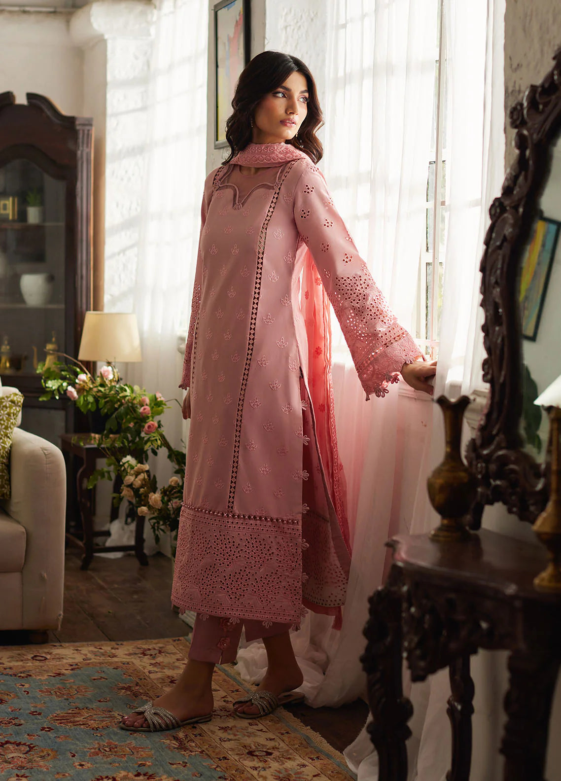 Model wearing blush pink Zerin from Gulaal Lumiere Chikankaari Lawn, Pakistani luxury pret and Pakistani clothes online in UK.