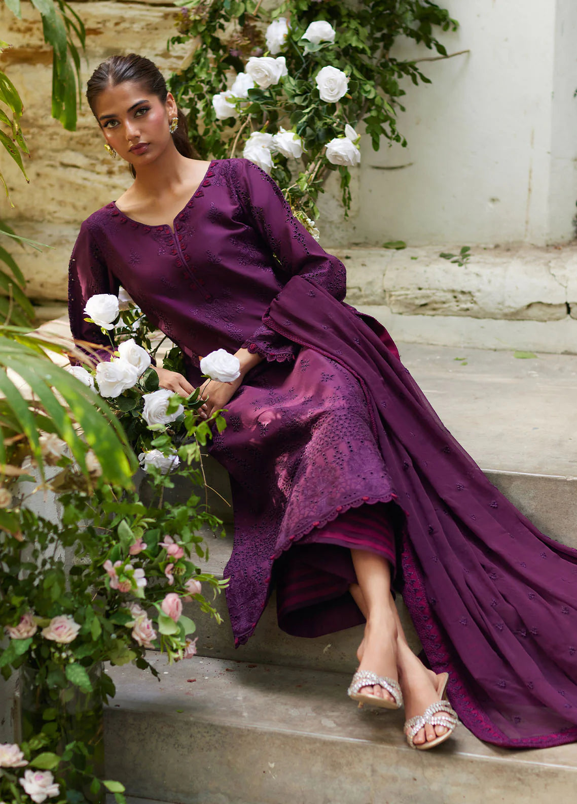 Model wearing deep plum Amora from Gulaal Lumiere Chikankaari Lawn, Pakistani luxury pret and Pakistani clothes online in UK.