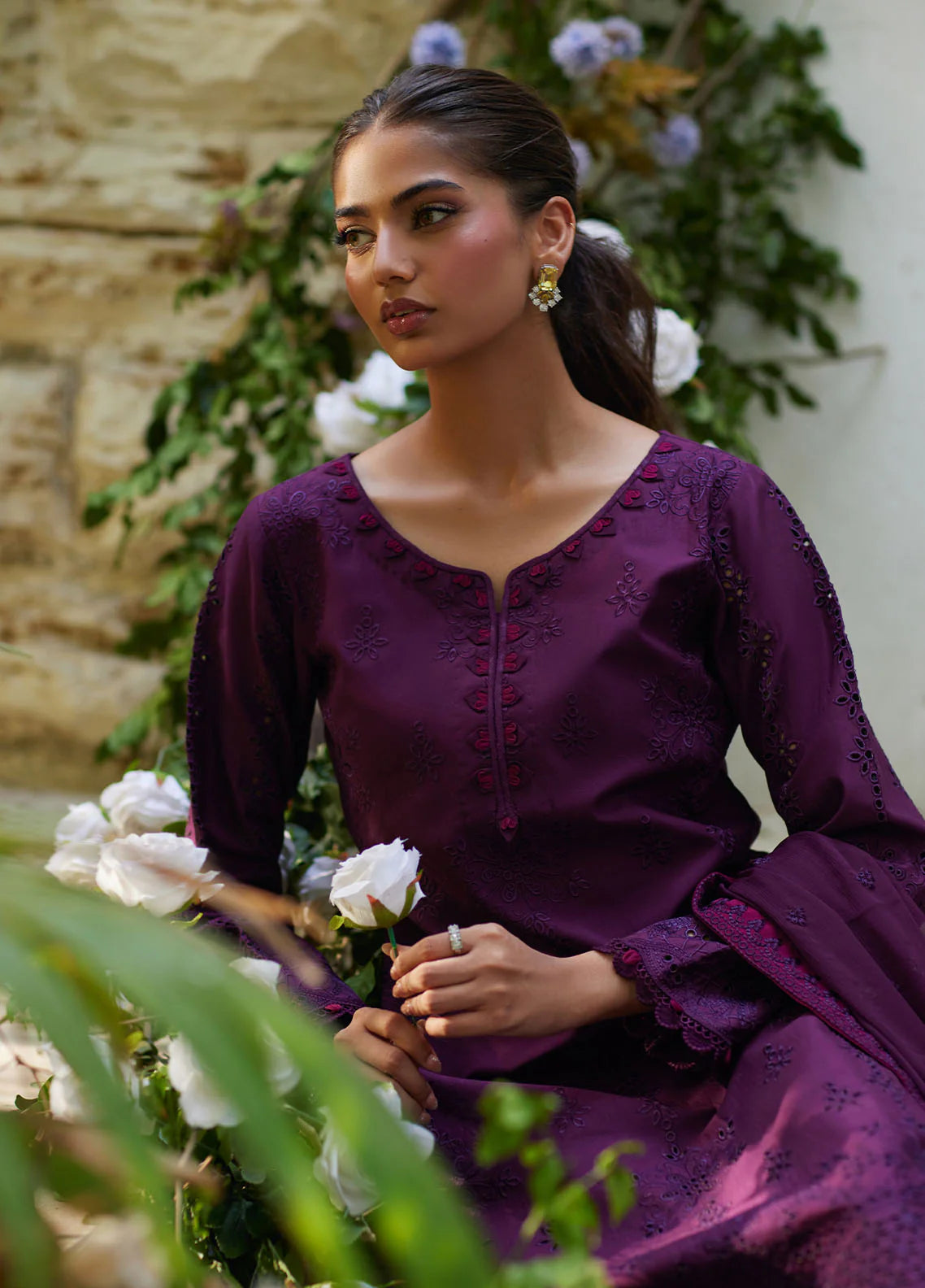 Model wearing deep plum Amora from Gulaal Lumiere Chikankaari Lawn, Pakistani luxury pret and Pakistani clothes online in UK.