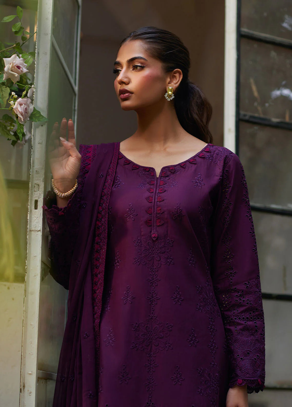 Model wearing deep plum Amora from Gulaal Lumiere Chikankaari Lawn, Pakistani luxury pret and Pakistani clothes online in UK.