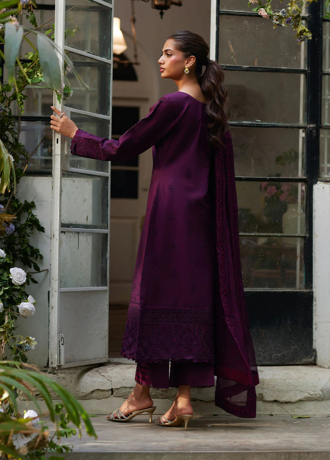 Model wearing deep plum Amora from Gulaal Lumiere Chikankaari Lawn, Pakistani luxury pret and Pakistani clothes online in UK.