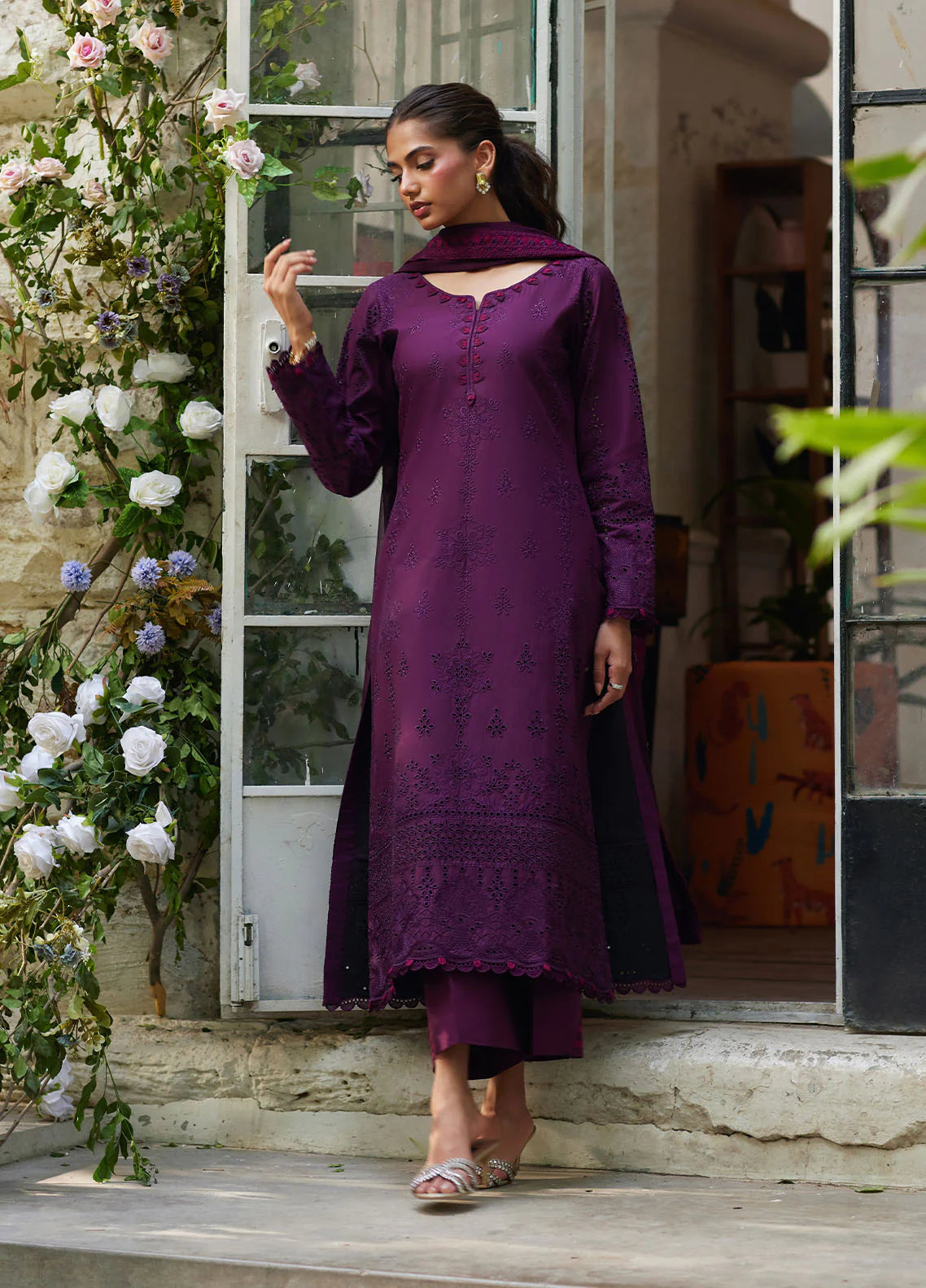 Model wearing deep plum Amora from Gulaal Lumiere Chikankaari Lawn, Pakistani luxury pret and Pakistani clothes online in UK.