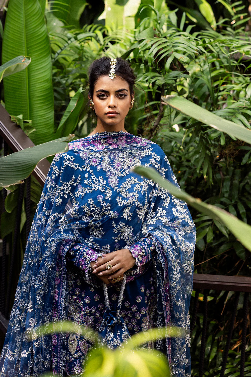 Model wearing Saira Rizwan DELARA-SRF25-08 in deep blue with floral embroidery – Pakistani luxury pret outfit, shop online in UK.