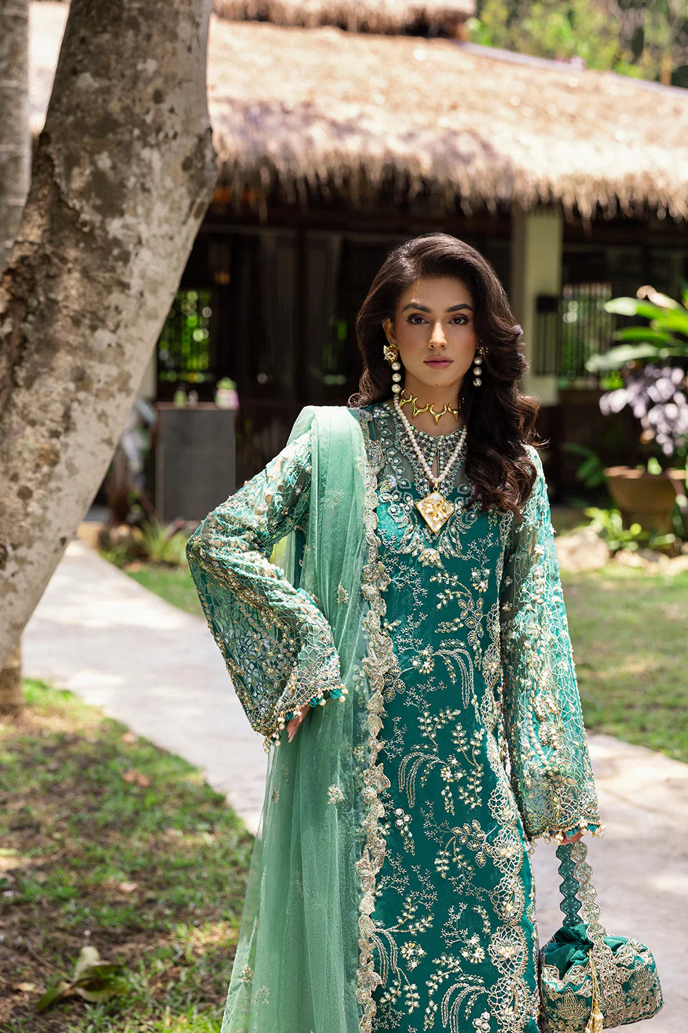Model wearing Saira Rizwan KIANA-SRF25-04 in emerald green with silver embellishments – Pakistani luxury pret, shop online in UK.