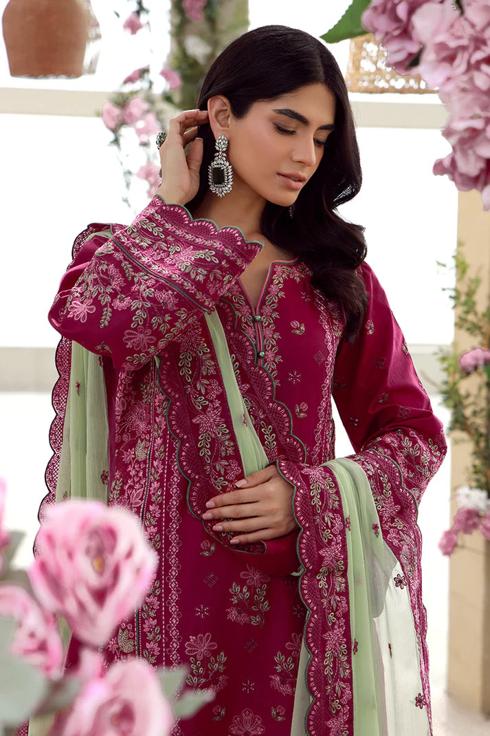 Model wearing deep magenta Gulaal Aaliyah outfit with intricate embroidery, ideal for Pakistani luxury pret and festive wear online in UK.