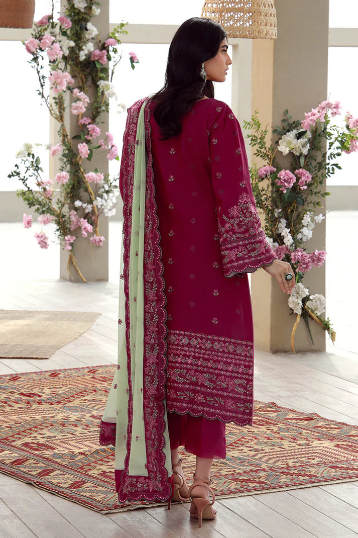Model wearing deep magenta Gulaal Aaliyah outfit with intricate embroidery, ideal for Pakistani luxury pret and festive wear online in UK.