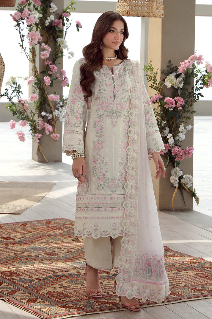 Model wearing off-white and pink embroidered Gulaal Kaia suit, perfect for Eid celebrations and Pakistani luxury pret online in UK.