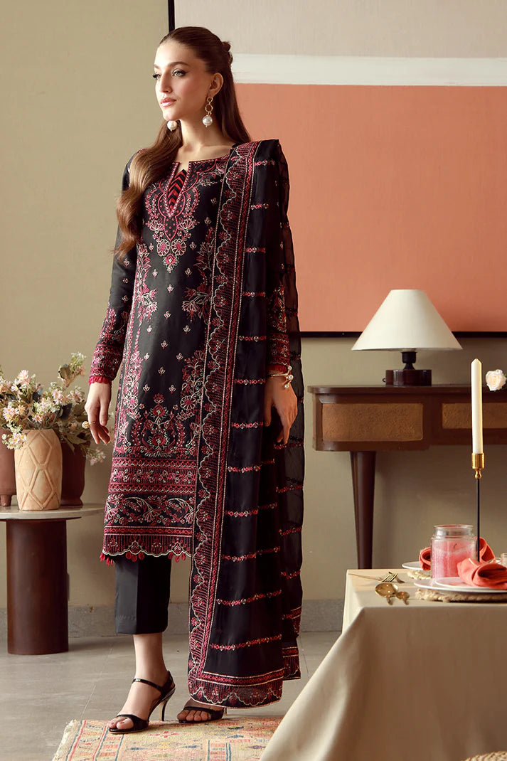Model wearing black and maroon embroidered Gulaal Faina outfit, perfect for Eid wear and Pakistani luxury pret available online in the UK.