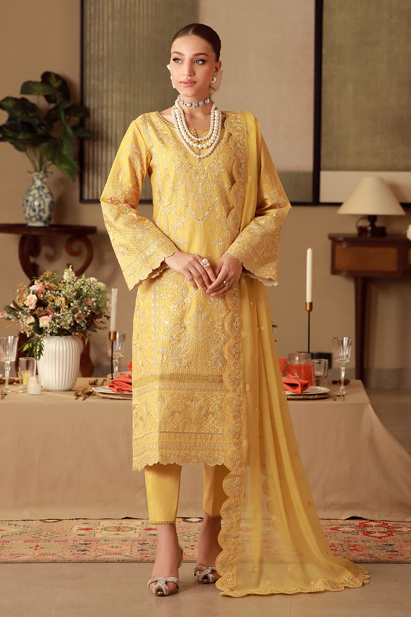 Model wearing mustard yellow embroidered Gulaal Ura outfit, ideal for Eid wear and Pakistani luxury pret, available online in the UK.