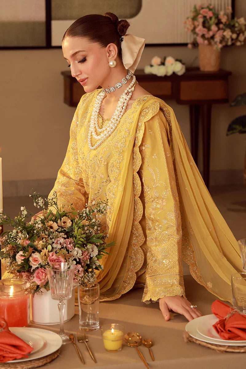 Model wearing mustard yellow embroidered Gulaal Ura outfit, ideal for Eid wear and Pakistani luxury pret, available online in the UK.