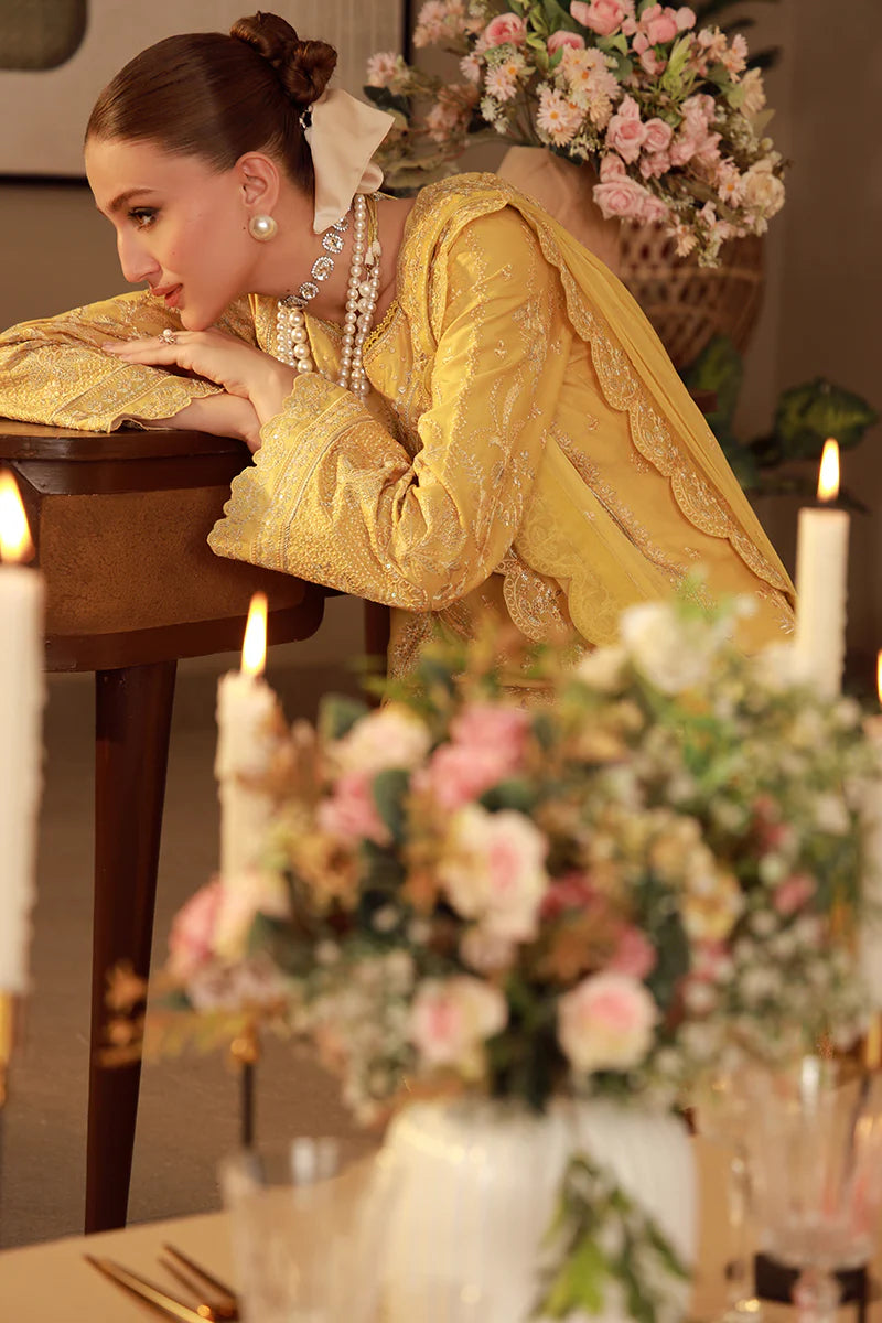 Model wearing mustard yellow embroidered Gulaal Ura outfit, ideal for Eid wear and Pakistani luxury pret, available online in the UK.