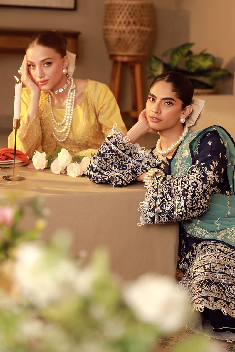 Model wearing mustard yellow embroidered Gulaal Ura outfit, ideal for Eid wear and Pakistani luxury pret, available online in the UK.