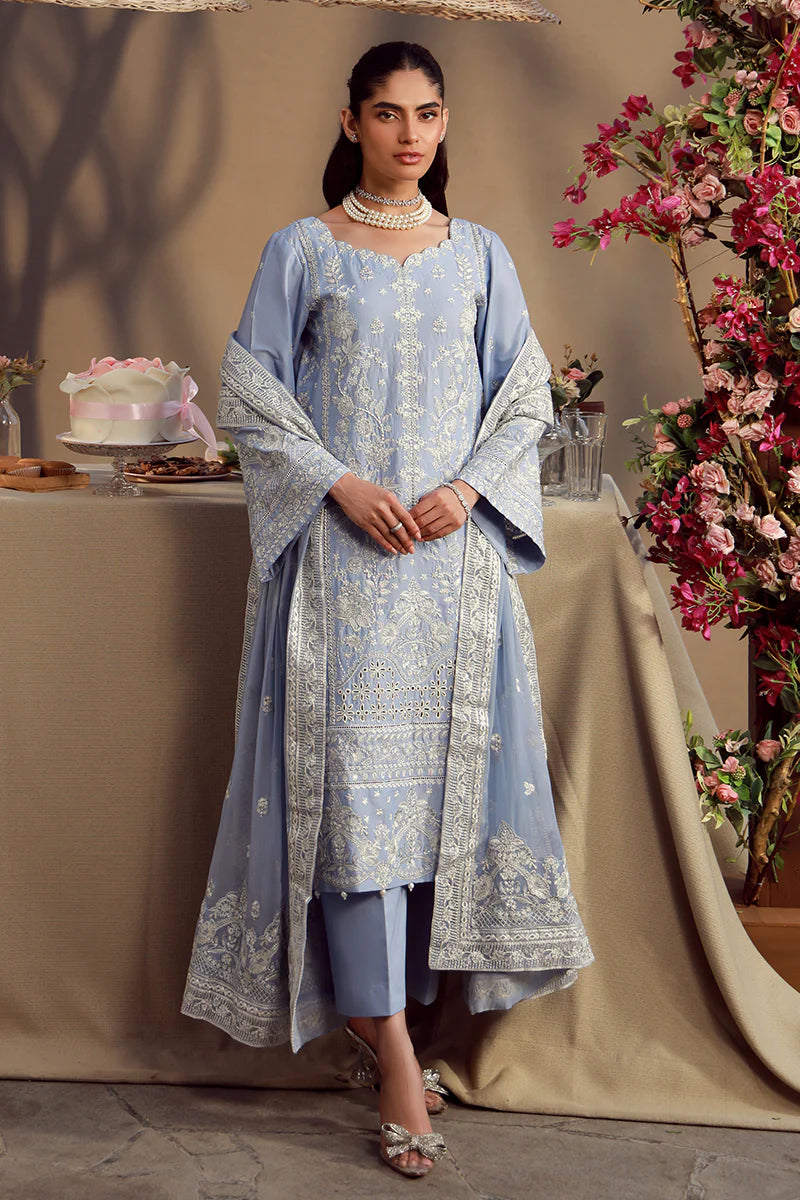 Model wearing cashmere blue embroidered Nehal outfit from Gulaal Festive Pret, perfect for Pakistani luxury pret and Eid wear in the UK.