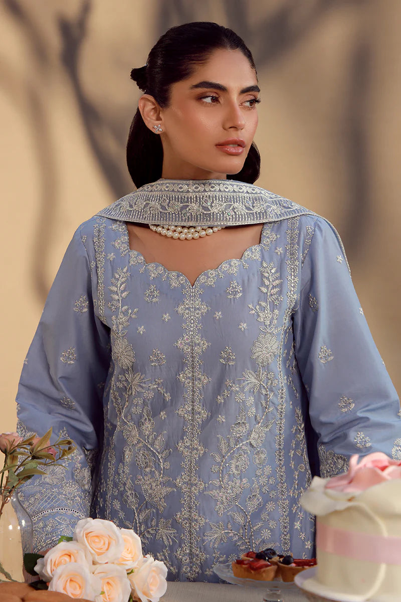 Model wearing cashmere blue embroidered Nehal outfit from Gulaal Festive Pret, perfect for Pakistani luxury pret and Eid wear in the UK.