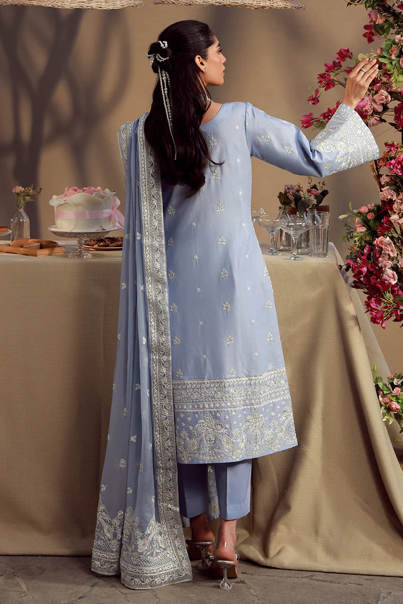 Model wearing cashmere blue embroidered Nehal outfit from Gulaal Festive Pret, perfect for Pakistani luxury pret and Eid wear in the UK.