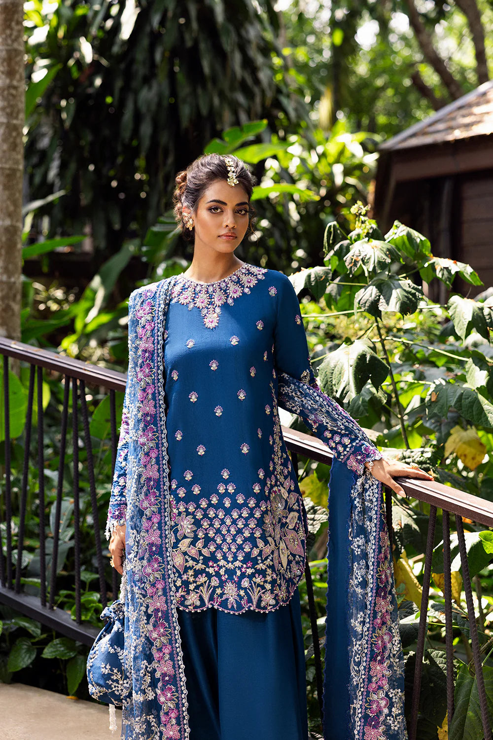 Model wearing Saira Rizwan DELARA-SRF25-08 in deep blue with floral embroidery – Pakistani luxury pret outfit, shop online in UK.
