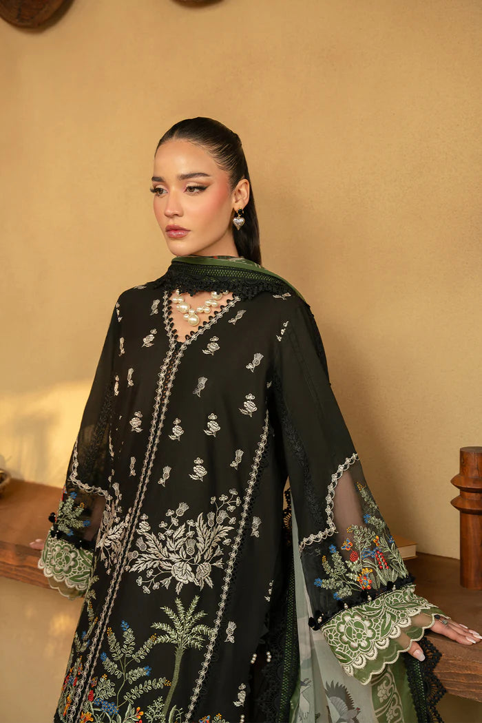 Model wearing black embroidered shirt with green and ivory detailing and matching dupatta from Saira Rizwan, Pakistani luxury pret, Pakistani clothes online in UK.