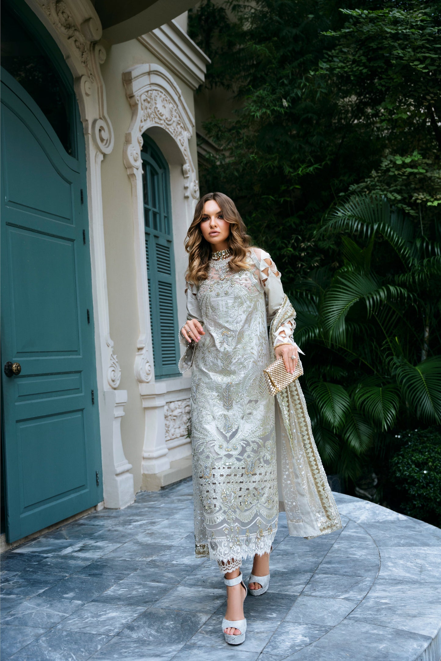 Model wearing Helena dress from Mysie by Tahira in a soft gold color, perfect for Pakistani luxury pret and online shopping in the UK.
