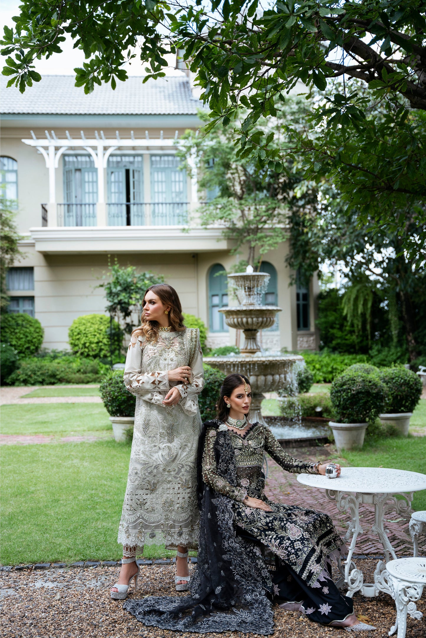 Model wearing Helena dress from Mysie by Tahira in a soft gold color, perfect for Pakistani luxury pret and online shopping in the UK.