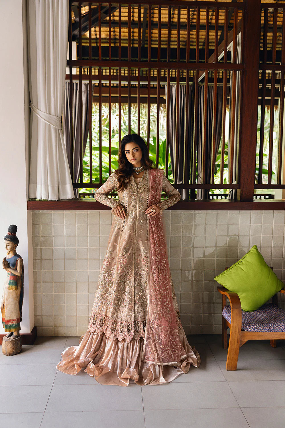 Model wearing Saira Rizwan ROHANA-SRF25-03 in champagne gold with pastel embroidery – Pakistani luxury pret, shop online in UK.