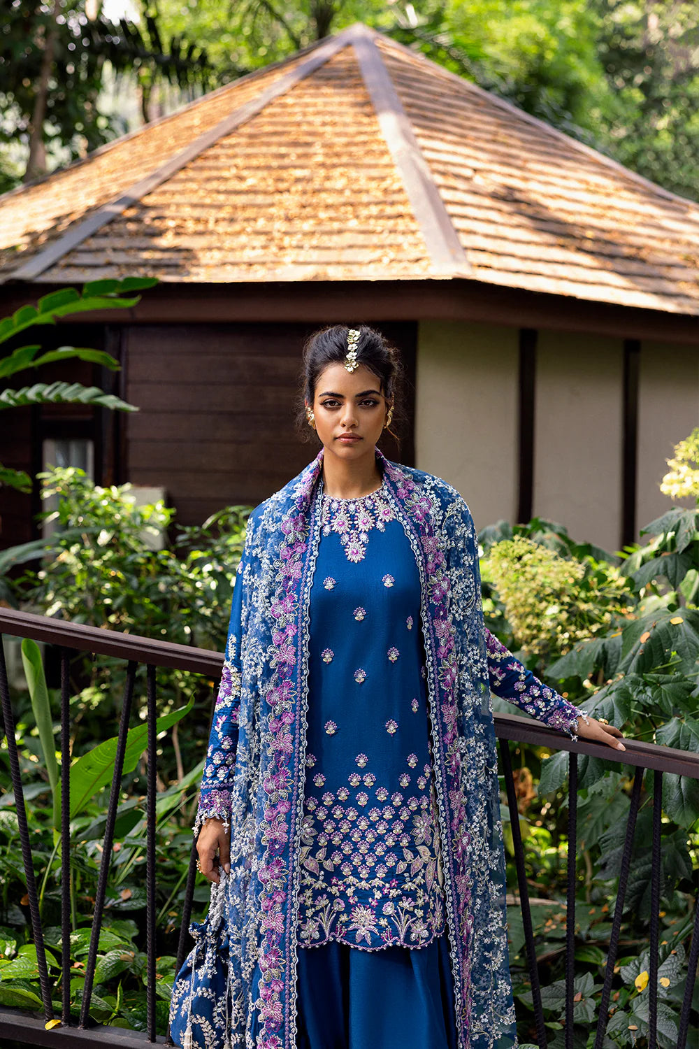 Model wearing Saira Rizwan DELARA-SRF25-08 in deep blue with floral embroidery – Pakistani luxury pret outfit, shop online in UK.
