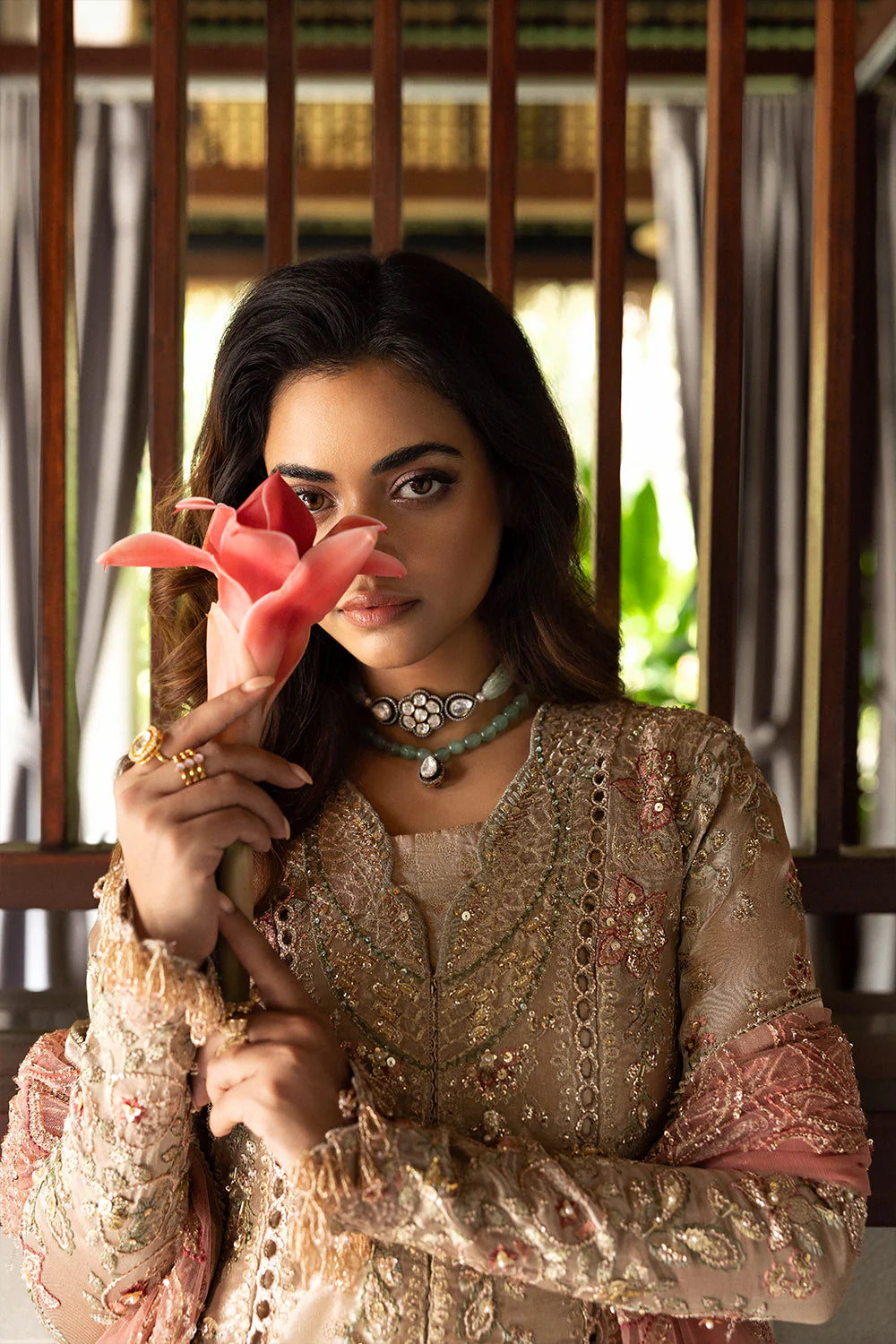 Model wearing Saira Rizwan ROHANA-SRF25-03 in champagne gold with pastel embroidery – Pakistani luxury pret, shop online in UK.