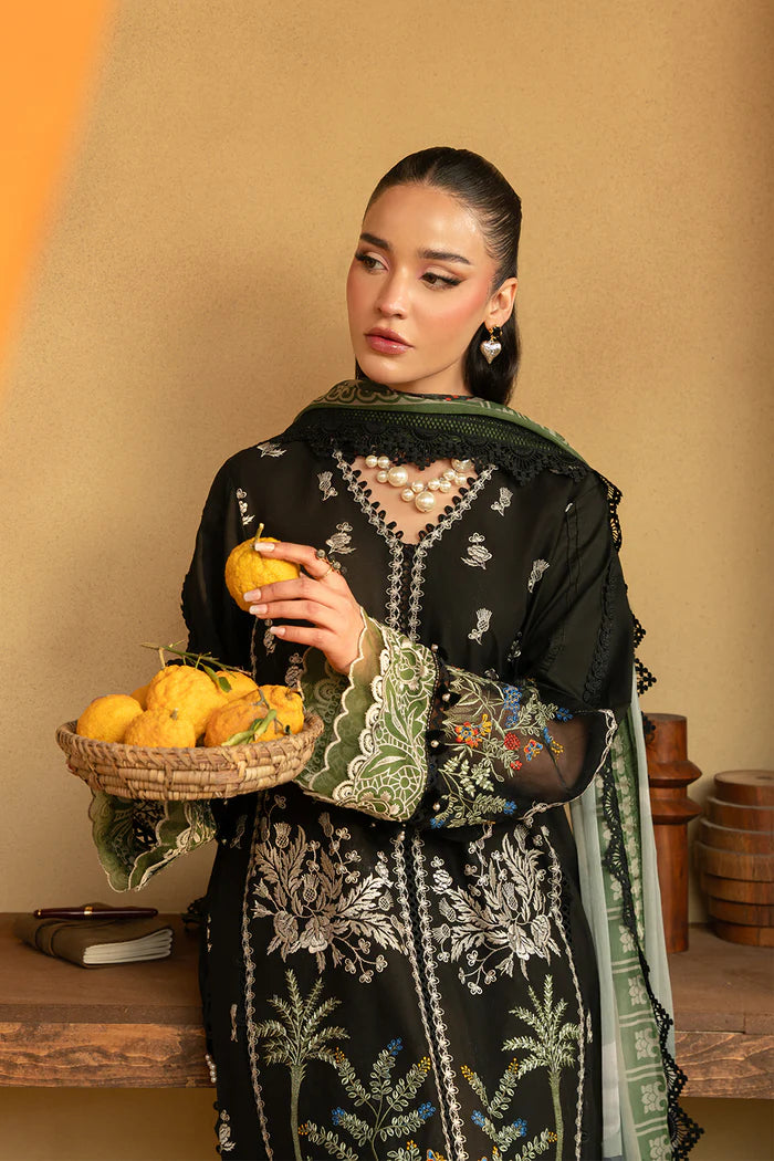 Model wearing black embroidered shirt with green and ivory detailing and matching dupatta from Saira Rizwan, Pakistani luxury pret, Pakistani clothes online in UK.