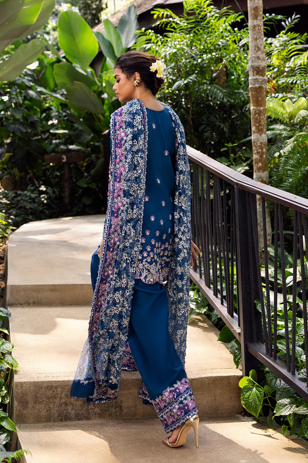 Model wearing Saira Rizwan DELARA-SRF25-08 in deep blue with floral embroidery – Pakistani luxury pret outfit, shop online in UK.