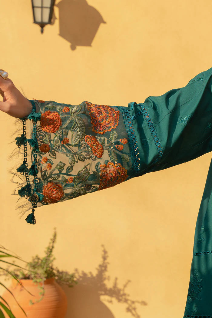 Model wearing emerald green embroidered dress with floral printed dupatta from Saira Rizwan, Pakistani luxury pret, Pakistani clothes online in UK.