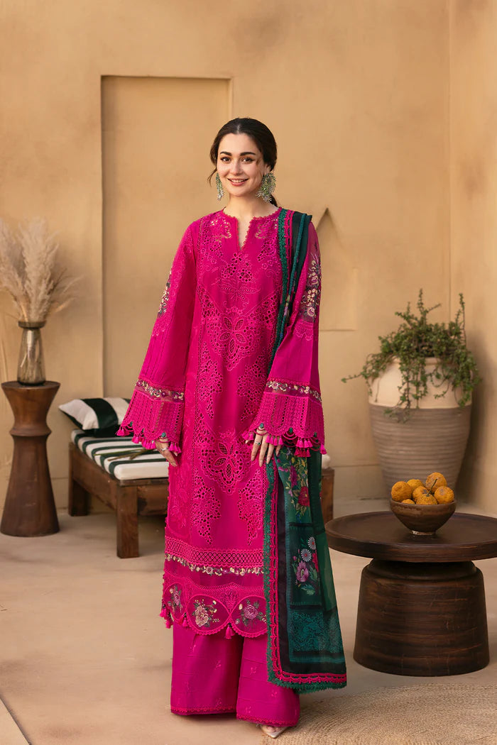 Model wearing hot pink embroidered three-piece suit with dark green printed dupatta from Saira Rizwan, Pakistani luxury pret, Pakistani clothes online in UK.